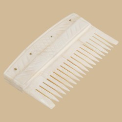 Engraved bone comb