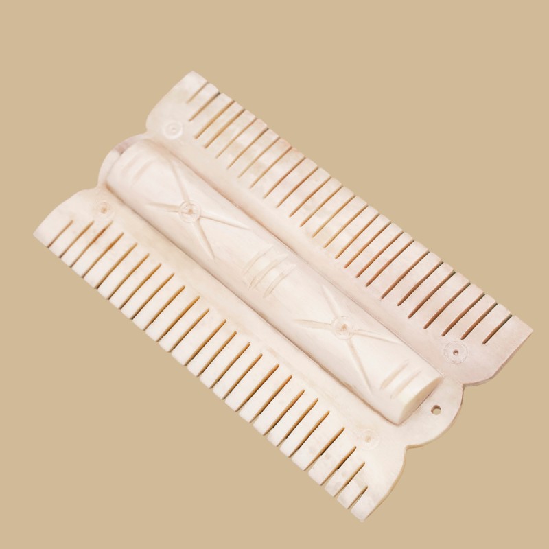 Double-sided bone comb